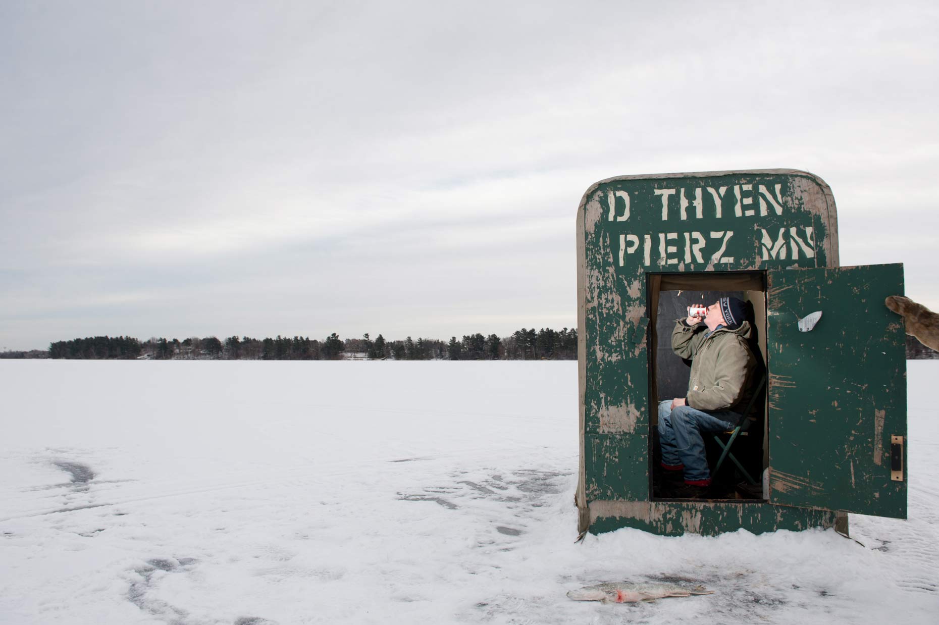 Ice fishing in Minnesota photographed by Jennifer May